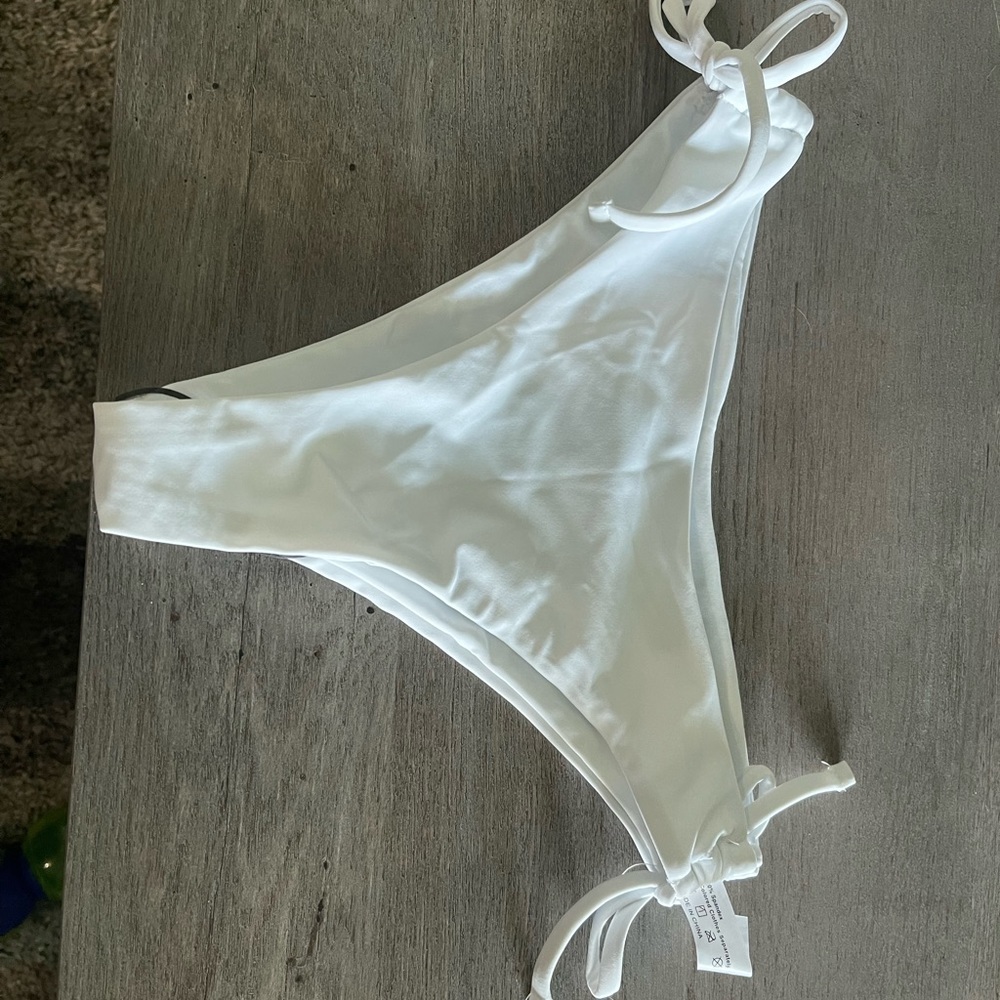Double white bathing suit bottoms